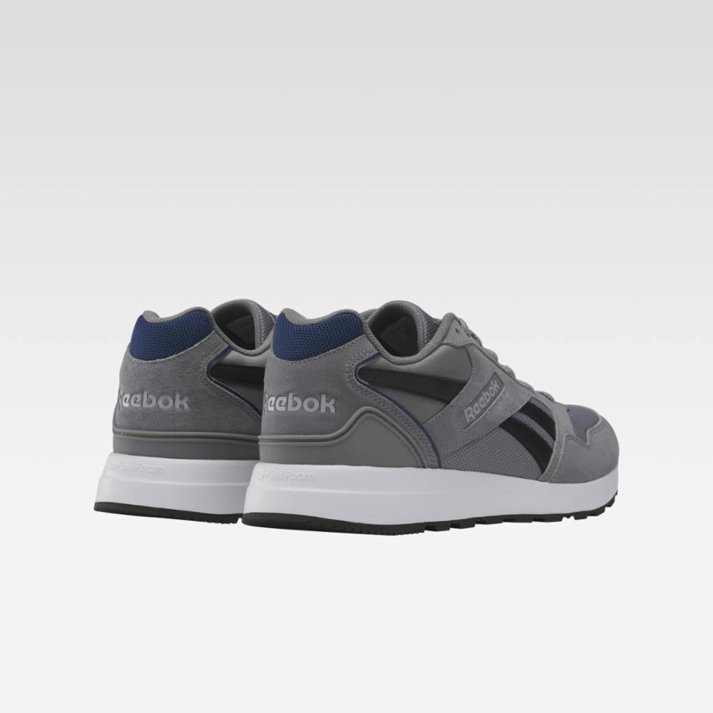 Reebok Footwear Men GL 1000 Shoes PUGRY5/FTWWHT/UNIBLU Trendy Design